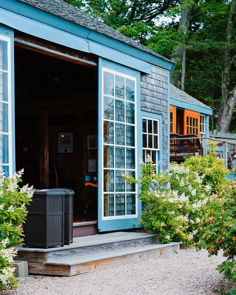 Vintage village home design with new modern windows